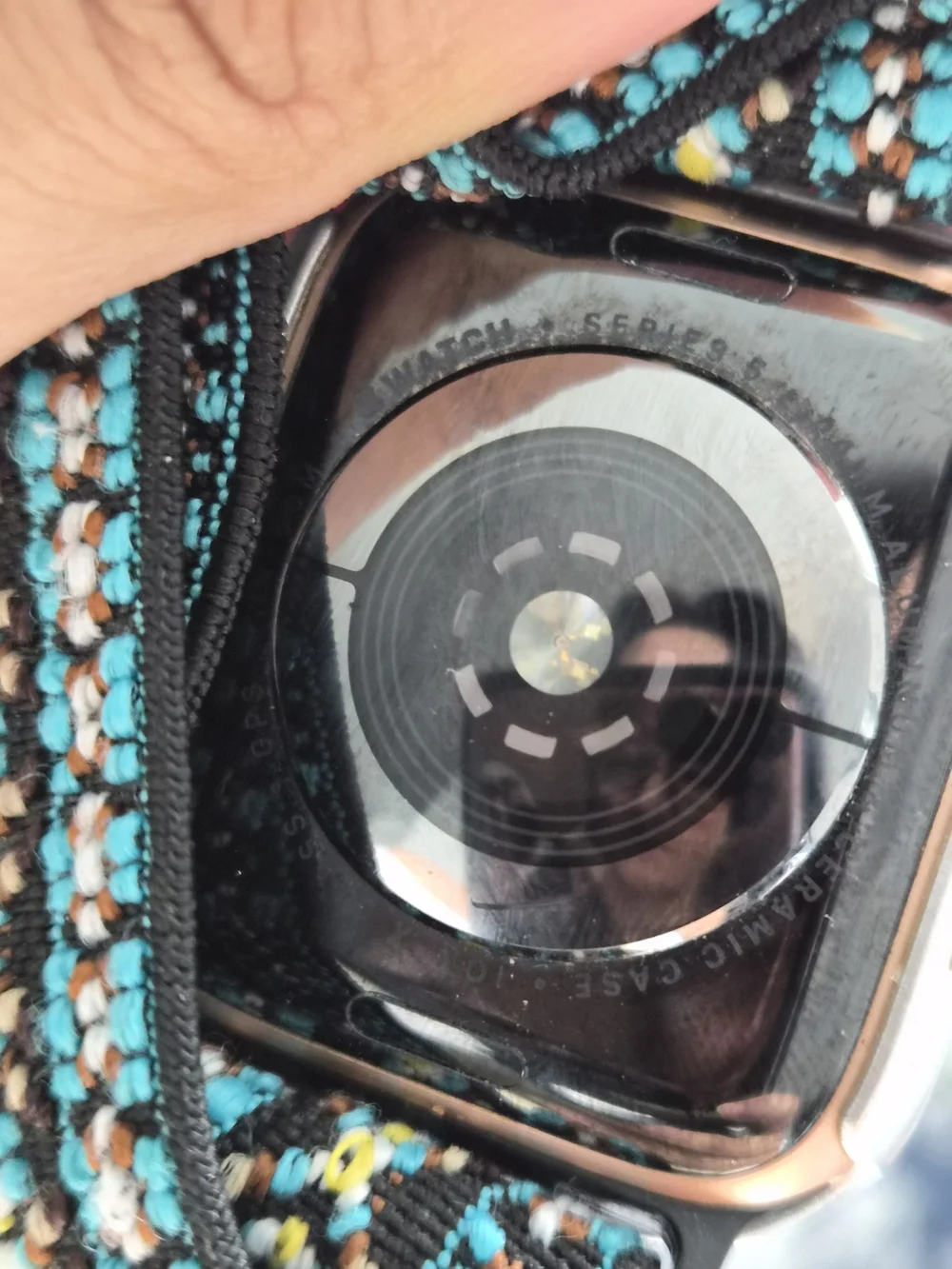 Apple Smartwatch with Black Case and Teal Patterned Woven Band